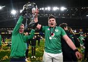 16 March 2024; Joe McCarthy of Ireland and his brother Andrew celebrate with the Six Nations trophy after the Guinness Six Nations Rugby Championship match between Ireland and Scotland at the Aviva Stadium in Dublin. Photo by Harry Murphy/Sportsfile