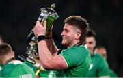 16 March 2024; Joe McCarthy of Ireland with the Six Nations trophy after the Guinness Six Nations Rugby Championship match between Ireland and Scotland at the Aviva Stadium in Dublin. Photo by Brendan Moran/Sportsfile