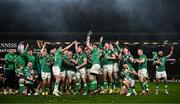 16 March 2024; Ireland players celebrate with the Six Nations trophy after the Guinness Six Nations Rugby Championship match between Ireland and Scotland at the Aviva Stadium in Dublin. Photo by Harry Murphy/Sportsfile