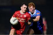 16 March 2024; Darragh Canavan of Tyrone in action against Ryan O'Toole of Monaghan during the Allianz Football League Division 1 match between Tyrone and Monaghan at O'Neills Healy Park in Omagh, Tyrone.  Photo by Ramsey Cardy/Sportsfile