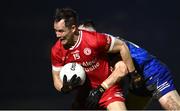 16 March 2024; Kieran McGeary of Tyrone in action against Jason Irwin of Monaghan during the Allianz Football League Division 1 match between Tyrone and Monaghan at O'Neills Healy Park in Omagh, Tyrone.  Photo by Ramsey Cardy/Sportsfile