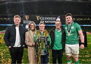 16 March 2024; Joe McCarthy of Ireland with his family, from left, brother Paddy, mother Paula, brother Andrew, father Joe during the Guinness Six Nations Rugby Championship match between Ireland and Scotland at the Aviva Stadium in Dublin. Photo by Harry Murphy/Sportsfile