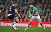16 March 2024; Robbie Henshaw of Ireland in action against Kyle Steyn of Scotland during the Guinness Six Nations Rugby Championship match between Ireland and Scotland at the Aviva Stadium in Dublin. Photo by Brendan Moran/Sportsfile