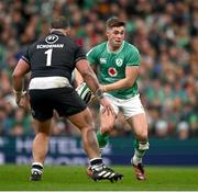 16 March 2024; Jack Crowley of Ireland in action against Pierre Schoeman of Scotland during the Guinness Six Nations Rugby Championship match between Ireland and Scotland at the Aviva Stadium in Dublin. Photo by Brendan Moran/Sportsfile