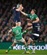 16 March 2024; Huw Jones of Scotland in action against Garry Ringrose of Ireland during the Guinness Six Nations Rugby Championship match between Ireland and Scotland at the Aviva Stadium in Dublin. Photo by Brendan Moran/Sportsfile