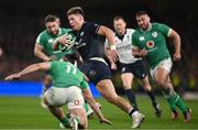 16 March 2024; Huw Jones of Scotland on the way to scoring his side's first try during the Guinness Six Nations Rugby Championship match between Ireland and Scotland at the Aviva Stadium in Dublin. Photo by Brendan Moran/Sportsfile