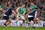 16 March 2024; Jack Crowley of Ireland, supported by teammate Joe McCarthy, in action against George Turner and Pierre Schoeman of Scotland during the Guinness Six Nations Rugby Championship match between Ireland and Scotland at the Aviva Stadium in Dublin. Photo by Brendan Moran/Sportsfile