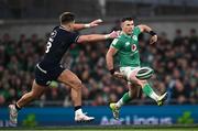 16 March 2024; Calvin Nash of Ireland in action against Huw Jones of Scotland during the Guinness Six Nations Rugby Championship match between Ireland and Scotland at the Aviva Stadium in Dublin. Photo by Harry Murphy/Sportsfile
