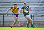 17 March 2024; Joe O'Connor of Kerry in action against Conor Hussey of Roscommon during the Allianz Football League Division 1 match between Roscommon and Kerry at Dr Hyde Park in Roscommon. Photo by Ben McShane/Sportsfile
