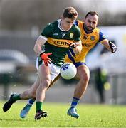 17 March 2024; Gavin White of Kerry in action against Donie Smith of Roscommon during the Allianz Football League Division 1 match between Roscommon and Kerry at Dr Hyde Park in Roscommon. Photo by Ben McShane/Sportsfile