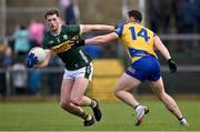 17 March 2024; Seán O'Brien of Kerry in action against Diarmuid Murtagh of Roscommon during the Allianz Football League Division 1 match between Roscommon and Kerry at Dr Hyde Park in Roscommon. Photo by Ben McShane/Sportsfile