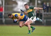 17 March 2024; Donie Smith of Roscommon is tackled by Graham O'Sullivan of Kerry during the Allianz Football League Division 1 match between Roscommon and Kerry at Dr Hyde Park in Roscommon. Photo by Ben McShane/Sportsfile