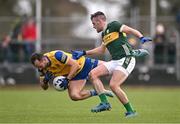 17 March 2024; Donie Smith of Roscommon is tackled by Graham O'Sullivan of Kerry during the Allianz Football League Division 1 match between Roscommon and Kerry at Dr Hyde Park in Roscommon. Photo by Ben McShane/Sportsfile