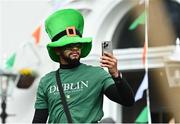 17 March 2024; An attendee is pictured as Team Ireland and PTSB take part in the St. Patrick’s Day Parade on the streets of Dublin as part of the celebrations of 100 years of Team Ireland competing at the Olympic Games. Photo by Tyler Miller/Sportsfile