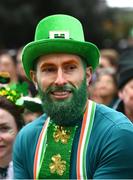 17 March 2024; An attendee is pictured as Team Ireland and PTSB take part in the St. Patrick’s Day Parade on the streets of Dublin as part of the celebrations of 100 years of Team Ireland competing at the Olympic Games. Photo by Tyler Miller/Sportsfile