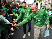 17 March 2024; Team Ireland athletes Eugene McGee, right, and Shane O'Donoghue are pictured as Team Ireland and PTSB take part in the St. Patrick’s Day Parade on the streets of Dublin as part of the celebrations of 100 years of Team Ireland competing at the Olympic Games. Photo by Tyler Miller/Sportsfile