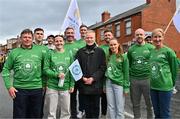 17 March 2024; Team Ireland athletes, from left, David Wilkins, Aidan Walsh, Michaela Walsh, Kenneth Egan, Shane Ryan, Shane O'Donoghue, Ellen Walshe, Eugene McGee and Catherina McKiernan are pictured with French Ambassador Vincent Guérend as Team Ireland and PTSB take part in the St. Patrick’s Day Parade on the streets of Dublin as part of the celebrations of 100 years of Team Ireland competing at the Olympic Games. Photo by Tyler Miller/Sportsfile
