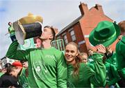 17 March 2024; Team Ireland athletes Ellen Walshe, right, and Shane Ryan are pictured as Team Ireland and PTSB take part in the St. Patrick’s Day Parade on the streets of Dublin as part of the celebrations of 100 years of Team Ireland competing at the Olympic Games. Photo by Tyler Miller/Sportsfile