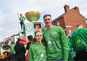 17 March 2024; Team Ireland athletes Ellen Walshe, left, and Shane Ryan are pictured as Team Ireland and PTSB take part in the St. Patrick’s Day Parade on the streets of Dublin as part of the celebrations of 100 years of Team Ireland competing at the Olympic Games. Photo by Tyler Miller/Sportsfile