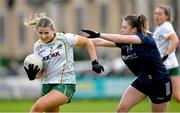 17 March 2024; Katie Newe of Meath in action against Hannah O’Donoghue of Kerry during the Lidl LGFA National League Division 1 Round 6 match between Meath and Kerry at Donaghmore Ashbourne GAA Club in Ashbourne, Meath. Photo by Brendan Moran/Sportsfile