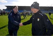 17 March 2024; Roscommon manager Davy Burke, left, and Kerry manager Jack O'Connor after the Allianz Football League Division 1 match between Roscommon and Kerry at Dr Hyde Park in Roscommon. Photo by Ben McShane/Sportsfile