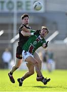 17 March 2024; Andy McCormack of Westmeath in action against James Guinness of Down during the Allianz Football League Division 3 match between Westmeath and Down at TEG Cusack Park in Mullingar, Westmeath. Photo by Seb Daly/Sportsfile