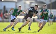 17 March 2024; Ryan McEvoy of Down in action against Matthew Whittaker of Westmeath, right, during the Allianz Football League Division 3 match between Westmeath and Down at TEG Cusack Park in Mullingar, Westmeath. Photo by Seb Daly/Sportsfile