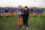 16 March 2024; Katie O’Meara of Loreto College Cavan receives the player of the match award from Gearldine Carey representing the LGFA following the 2024 Lidl All-Ireland Junior Post-Primary Schools Junior A Championship final between FCJ Secondary School, Bunclody, Wexford and Loreto College, Cavan, at the GAA National Games Development Centre, Abbotstown in Dublin. Photo by Michael P Ryan/Sportsfile *** NO REPRODUCTION FEE ***