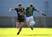 17 March 2024; Luke Loughlin of Westmeath in action against Pierce Laverty of Down during the Allianz Football League Division 3 match between Westmeath and Down at TEG Cusack Park in Mullingar, Westmeath. Photo by Seb Daly/Sportsfile