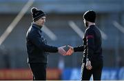 17 March 2024; Westmeath manager Des Dolan, left, and Down manager Conor Laverty shake hands after the Allianz Football League Division 3 match between Westmeath and Down at TEG Cusack Park in Mullingar, Westmeath. Photo by Seb Daly/Sportsfile