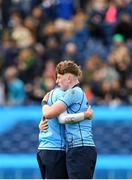 17 March 2024; St Michael's College players Patrick Wood, left, and Dan Ryan embrace after their side's defeat in the Bank of Ireland Leinster Schools Senior Cup final match between Blackrock College and St Michael's College at the RDS Arena in Dublin. Photo by Shauna Clinton/Sportsfile Photo by Shauna Clinton/Sportsfile