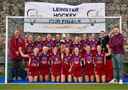 17 March 2024; The Loreto HC panel and staff celebrate with the cup after the Jacqui Potter Cup final match between UCD LHC and Loreto HC at Three Rock Rovers Hockey Club in Rathfarnham, Dublin. Photo by Tyler Miller/Sportsfile