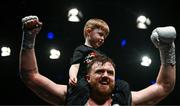17 March 2024; Thomas Carty celebrates with his nephew Sam Sweetman after beating Pavel Sour in their heavy weight boutat TF Royal Theatre in Castlebar, Mayo. Photo by Piaras Ó Mídheach/Sportsfile