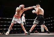 17 March 2024; Ray Moylette, left, in action against Reuquen Cona Facundo Arce during their super light weight bout at TF Royal Theatre in Castlebar, Mayo. Photo by Piaras Ó Mídheach/Sportsfile
