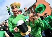 17 March 2024; Team Ireland athletes, Shane Ryan, left and Ellen Walshe are pictured as Team Ireland and PTSB take part in the St. Patrick’s Day Parade on the streets of Dublin as part of the celebrations of 100 years of Team Ireland competing at the Olympic Games.. Photo by Tyler Miller/Sportsfile