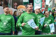 17 March 2024; Team Ireland athlete Kenneth Egan is pictured as Team Ireland and PTSB take part in the St. Patrick’s Day Parade on the streets of Dublin as part of the celebrations of 100 years of Team Ireland competing at the Olympic Games.. Photo by Tyler Miller/Sportsfile