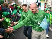 17 March 2024; Team Ireland athlete Eugene McGee is pictured as Team Ireland and PTSB take part in the St. Patrick’s Day Parade on the streets of Dublin as part of the celebrations of 100 years of Team Ireland competing at the Olympic Games.. Photo by Tyler Miller/Sportsfile