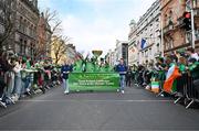 17 March 2024; The Team Ireland float is pictured as Team Ireland and PTSB take part in the St. Patrick’s Day Parade on the streets of Dublin as part of the celebrations of 100 years of Team Ireland competing at the Olympic Games.. Photo by Tyler Miller/Sportsfile