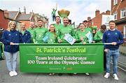 17 March 2024; Team Ireland athletes, from left, Catherina McKiernan, Eugene McGee, Shane O'Donoghue, Ellen Walshe, Shane Ryan, Kenneth Egan, Michaela Walsh and Aidan Walsh are pictured as Team Ireland and PTSB take part in the St. Patrick’s Day Parade on the streets of Dublin as part of the celebrations of 100 years of Team Ireland competing at the Olympic Games. Photo by Tyler Miller/Sportsfile