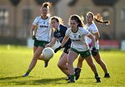 17 March 2024; Emma Duggan of Meath in action against Kayleigh Cronin of Kerry during the Lidl LGFA National League Division 1 Round 6 match between Meath and Kerry at Donaghmore Ashbourne GAA Club in Ashbourne, Meath. Photo by Brendan Moran/Sportsfile