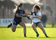 17 March 2024; Emma Duggan of Meath in action against Ciara Murphy of Kerry during the Lidl LGFA National League Division 1 Round 6 match between Meath and Kerry at Donaghmore Ashbourne GAA Club in Ashbourne, Meath. Photo by Brendan Moran/Sportsfile