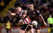15 March 2024; Dylan Connolly of Bohemians in action against Patrick McEleney of Derry City during the SSE Airtricity Men's Premier Division match between Bohemians and Derry City at Dalymount Park in Dublin. Photo by Stephen McCarthy/Sportsfile