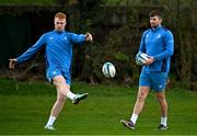 18 March 2024; Ciarán Frawley and Ross Byrne during a Leinster rugby squad training session at UCD in Dublin. Photo by Harry Murphy/Sportsfile