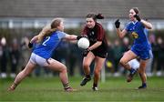 18 March 2024; Ellen Giblin of St Attracta's Community School in action against Sarah Bell, left, and Sarah Corcoran of Ursuline Secondary School during the 2024 Lidl LGFA All-Ireland Post-Primary Schools Senior B Championship final match between St Attracta’s Community School of Tubbercurry, Sligo, and Ursuline Secondary School of Thurles, Tipperary, at St Aidan’s GAA club in Ballyforan, Roscommon. Photo by Piaras Ó Mídheach/Sportsfile
