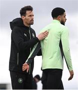 18 March 2024; Assistant coach Paddy McCarthy and Andrew Omobamidele during a Republic of Ireland training session at the FAI National Training Centre in Abbotstown, Dublin. Photo by Stephen McCarthy/Sportsfile