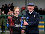 18 March 2024; St Attracta's Community School captain Ciara Brennan is presented with the cup by Connacht LGFA president Brendan Cregg after her side's victory in the 2024 Lidl LGFA All-Ireland Post-Primary Schools Senior B Championship final match between St Attracta’s Community School of Tubbercurry, Sligo, and Ursuline Secondary School of Thurles, Tipperary, at St Aidan’s GAA club in Ballyforan, Roscommon. Photo by Piaras Ó Mídheach/Sportsfile