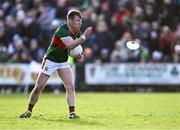 17 March 2024; Ryan O'Donoghue of Mayo throws away the kicking tee of Derry goalkeeper Odhran Lynch after referee Seán Lonergan cancelled Derry's kick-out due to a delay in taking it during the Allianz Football League Division 1 match between Mayo and Derry at Hastings Insurance MacHale Park in Castlebar, Mayo. Photo by Piaras Ó Mídheach/Sportsfile