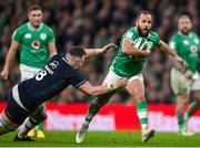 16 March 2024; Jamison Gibson-Park of Ireland is tackled by Jack Dempsey of Scotland during the Guinness Six Nations Rugby Championship match between Ireland and Scotland at the Aviva Stadium in Dublin. Photo by Sam Barnes/Sportsfile