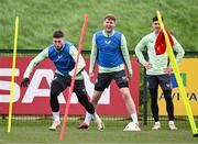 19 March 2024; Matt Doherty, left, with Nathan Collins and Callum O’Dowda, right, during a Republic of Ireland training session at the FAI National Training Centre in Abbotstown, Dublin. Photo by Stephen McCarthy/Sportsfile