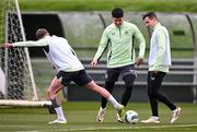 19 March 2024; Callum O’Dowda with Sammie Szmodics, left, and Josh Cullen, right, during a Republic of Ireland training session at the FAI National Training Centre in Abbotstown, Dublin. Photo by Stephen McCarthy/Sportsfile